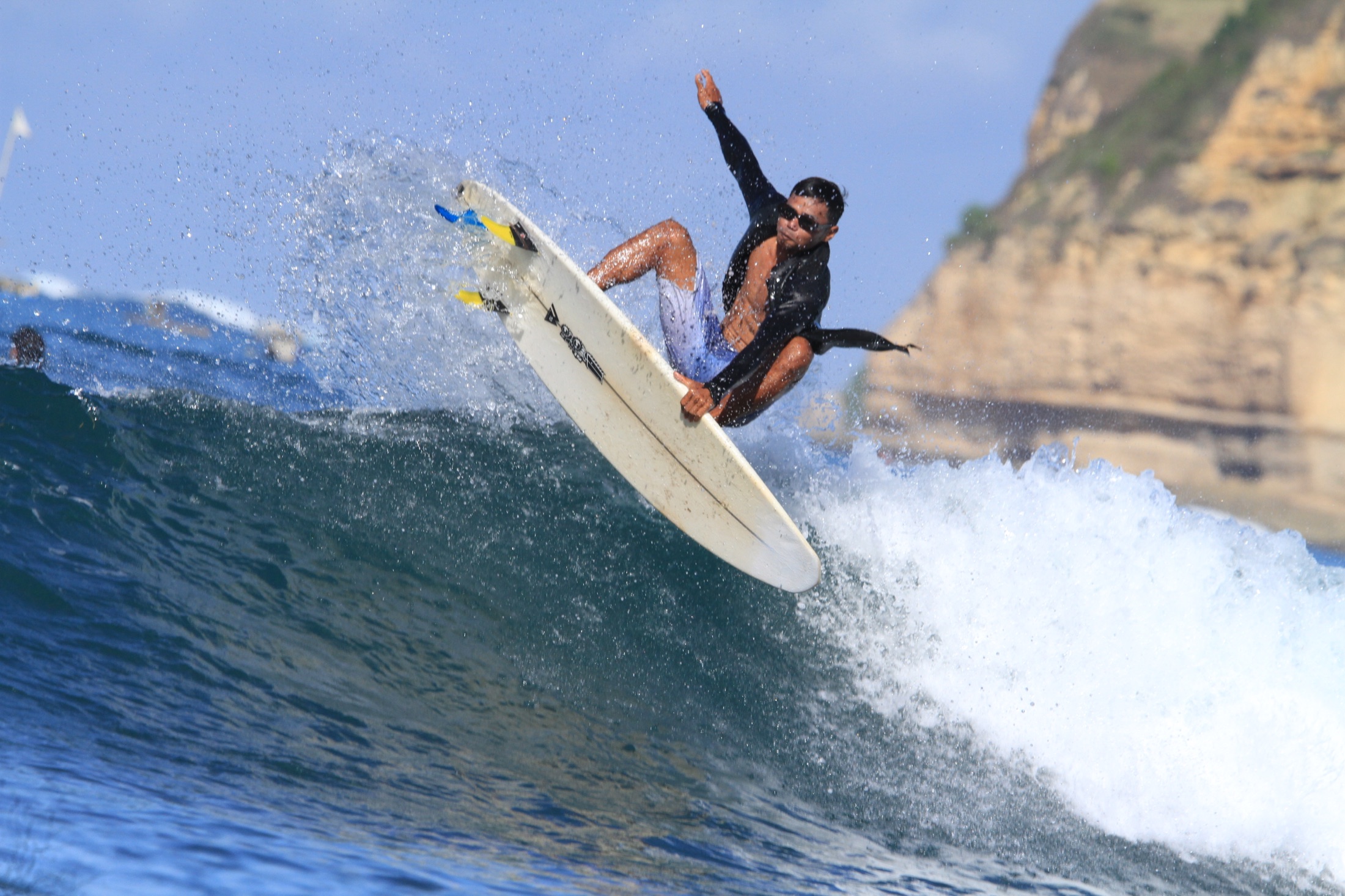 Dedy riding a wave in Lombok